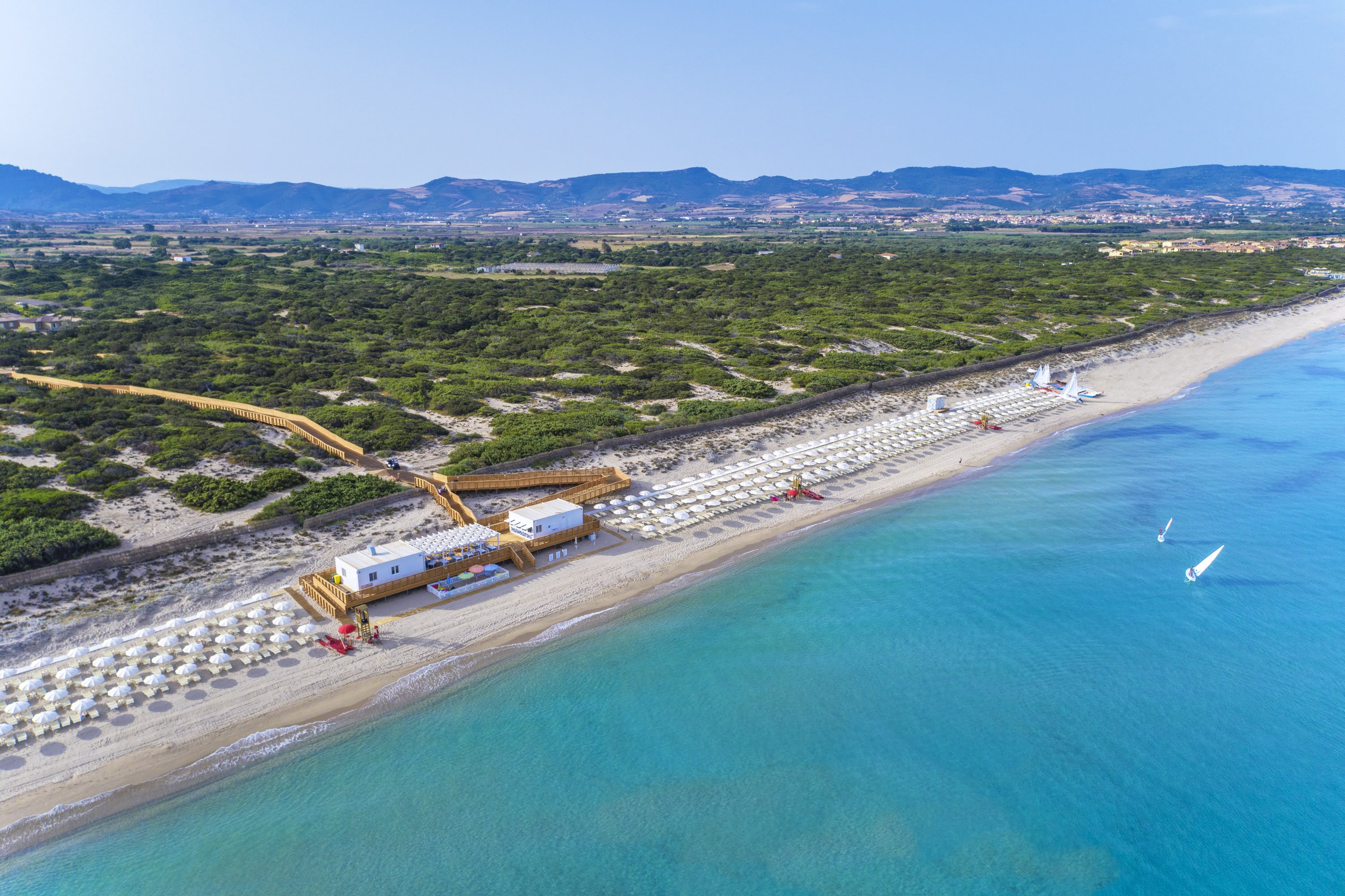 The exclusive Prestige Wing and beachfront pools at IS Serena Badesi in Sardinia, Italy, an all-inclusive luxury resort for families.